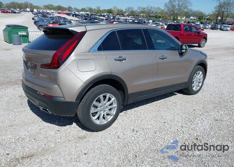 2023 Cadillac Xt4 Fwd Luxury from USA, damaged, VIN 1GYAZAR42PF109650